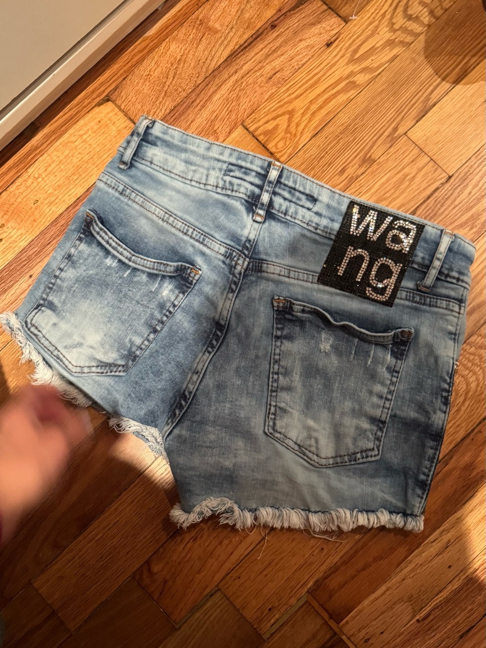 Alexander Wang Light Blue Distressed Denim Shorts with Rhinestone Logo